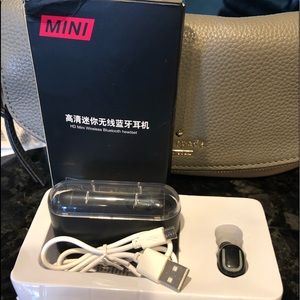 NIB Never Used Bluetooth Earbud with charger